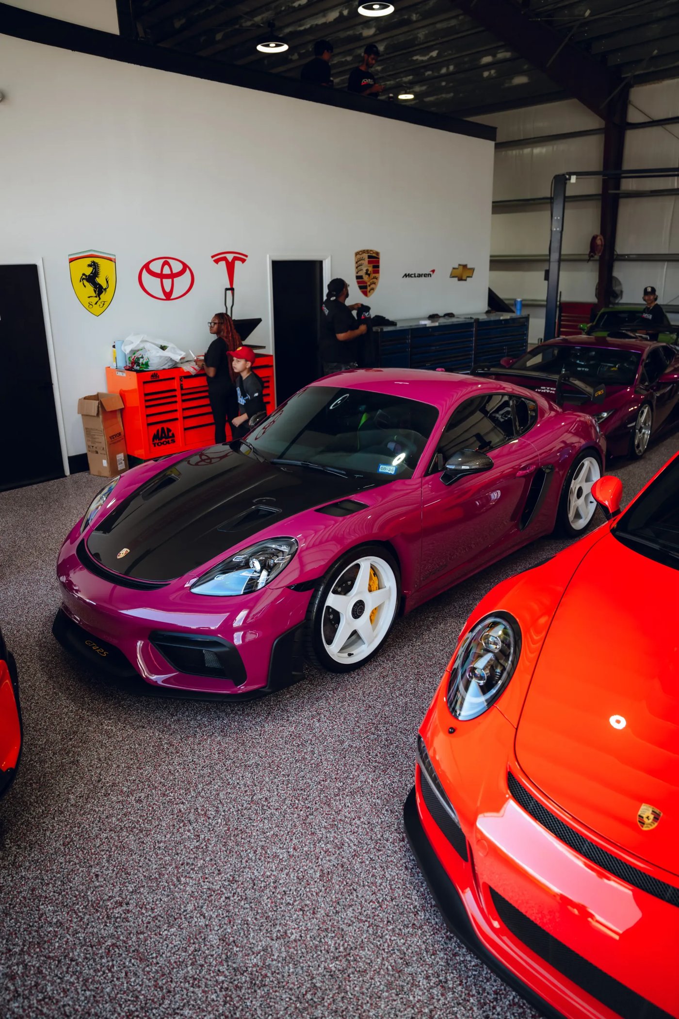 Porsche 718 Cayman GT4 RS in the Advance Automotive shop