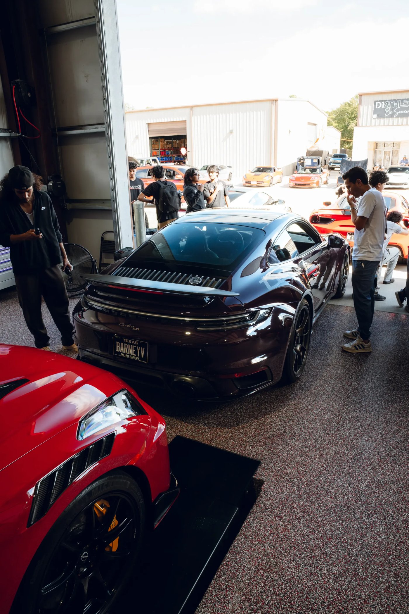 High-end sports cars in the shop bay